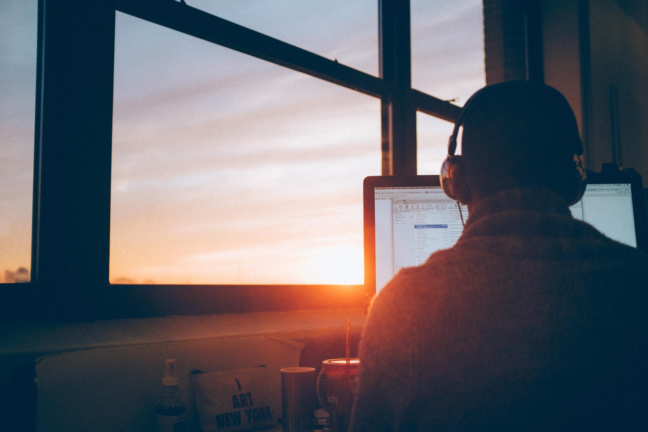 man working at a computer at a managed services provider