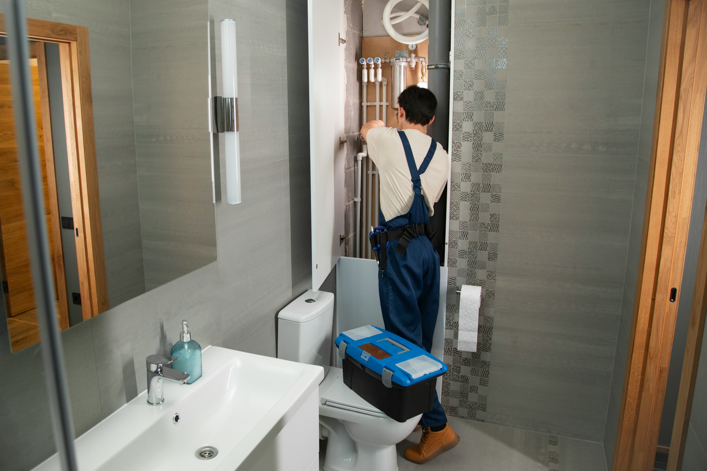 Professional plumber at work