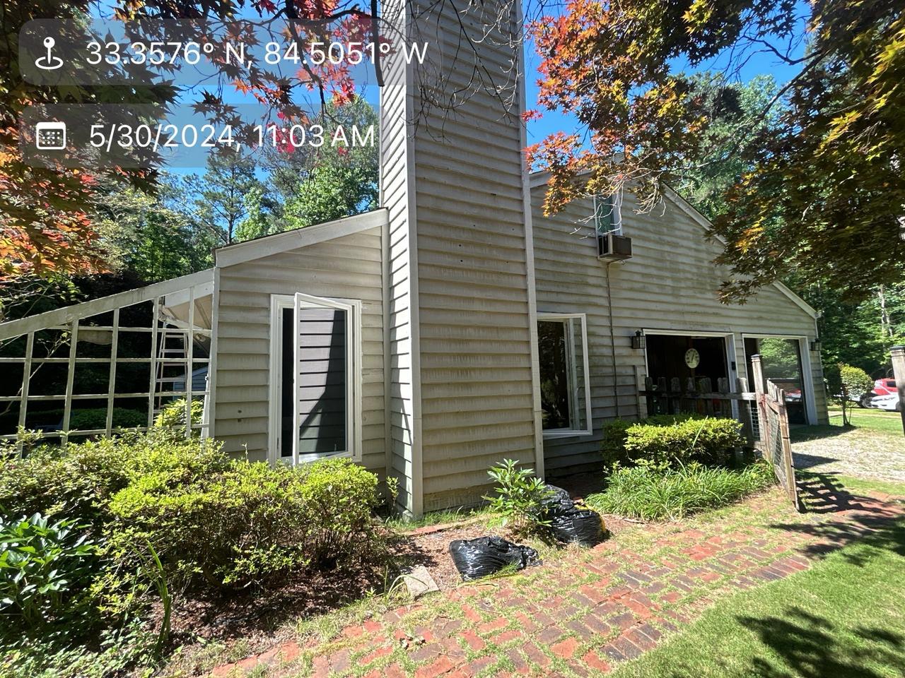 rob muzzillo before (siding) .jpg