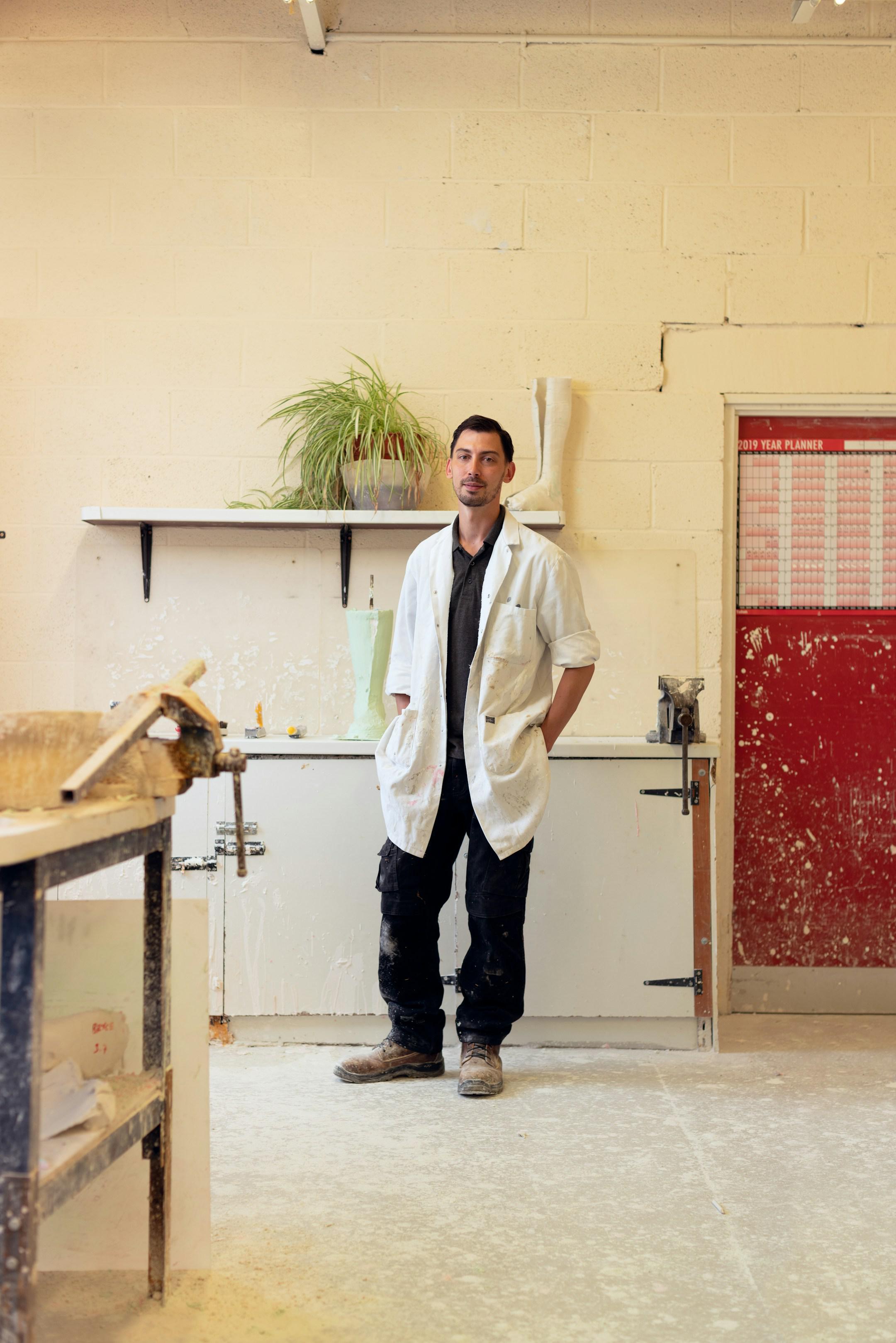 Male orthotic technician engineer in workshop