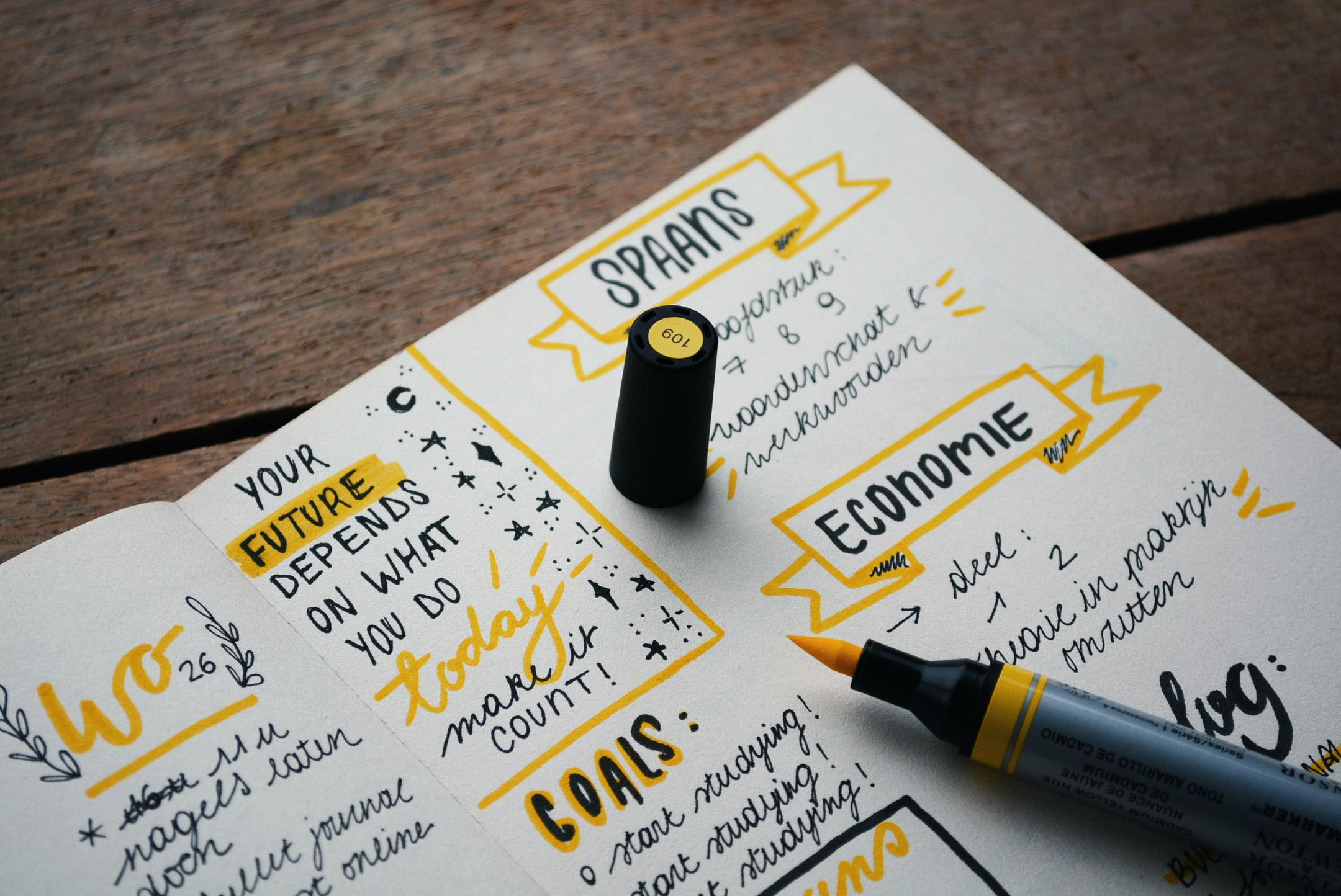 Image of someone writing themselves motivational notes to find a career college program in London, Ontario.