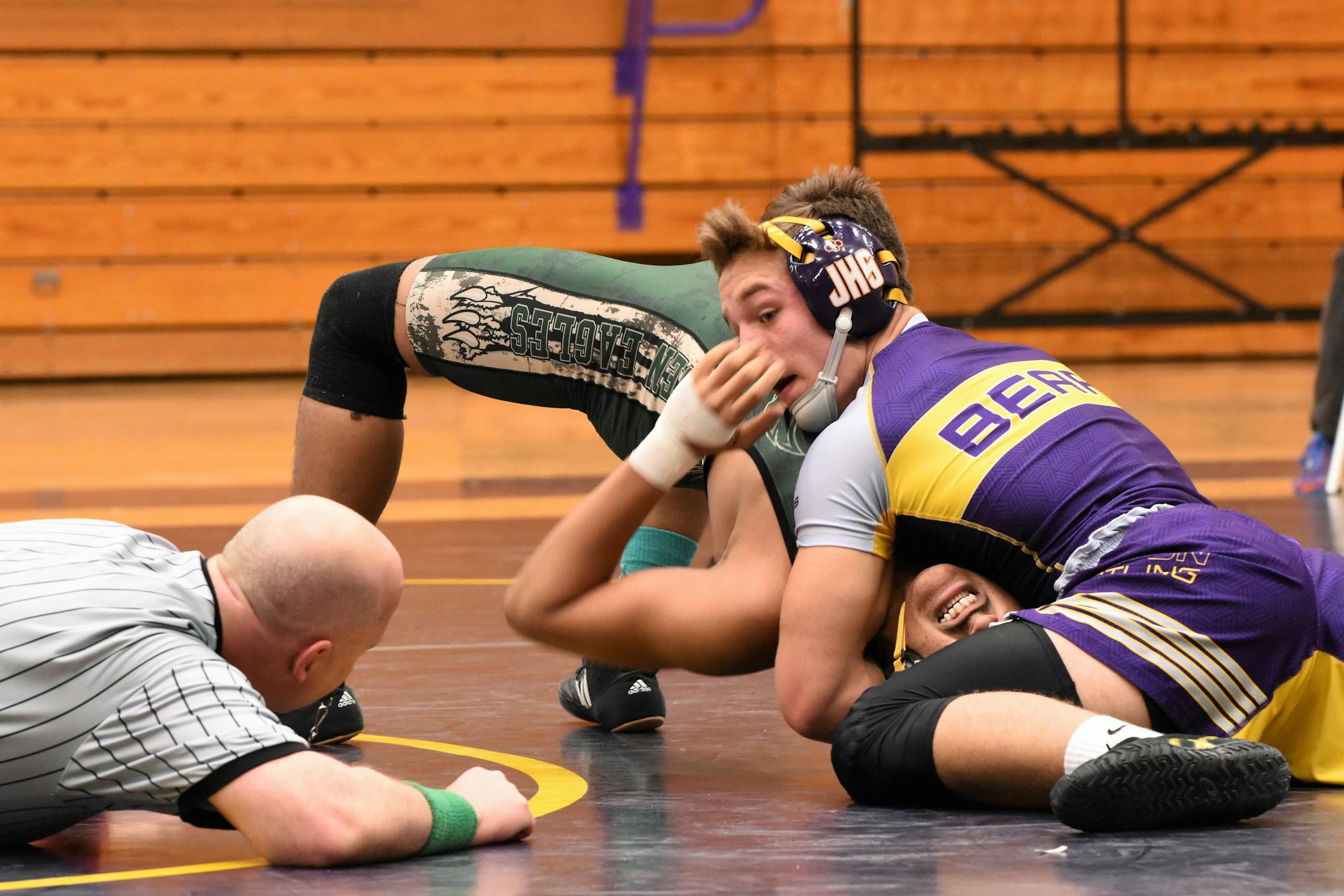 This image of the wrestler being pinned was taken while I was shooting for a local high school. It reminds me of the phrase “the thrill of victory and the agony of defeat”.