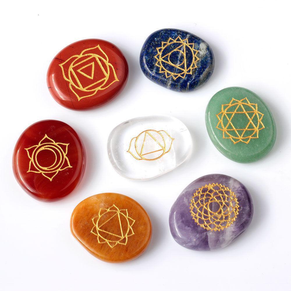 7-piece-engraved-chakra-stone-palm-stones.jpg