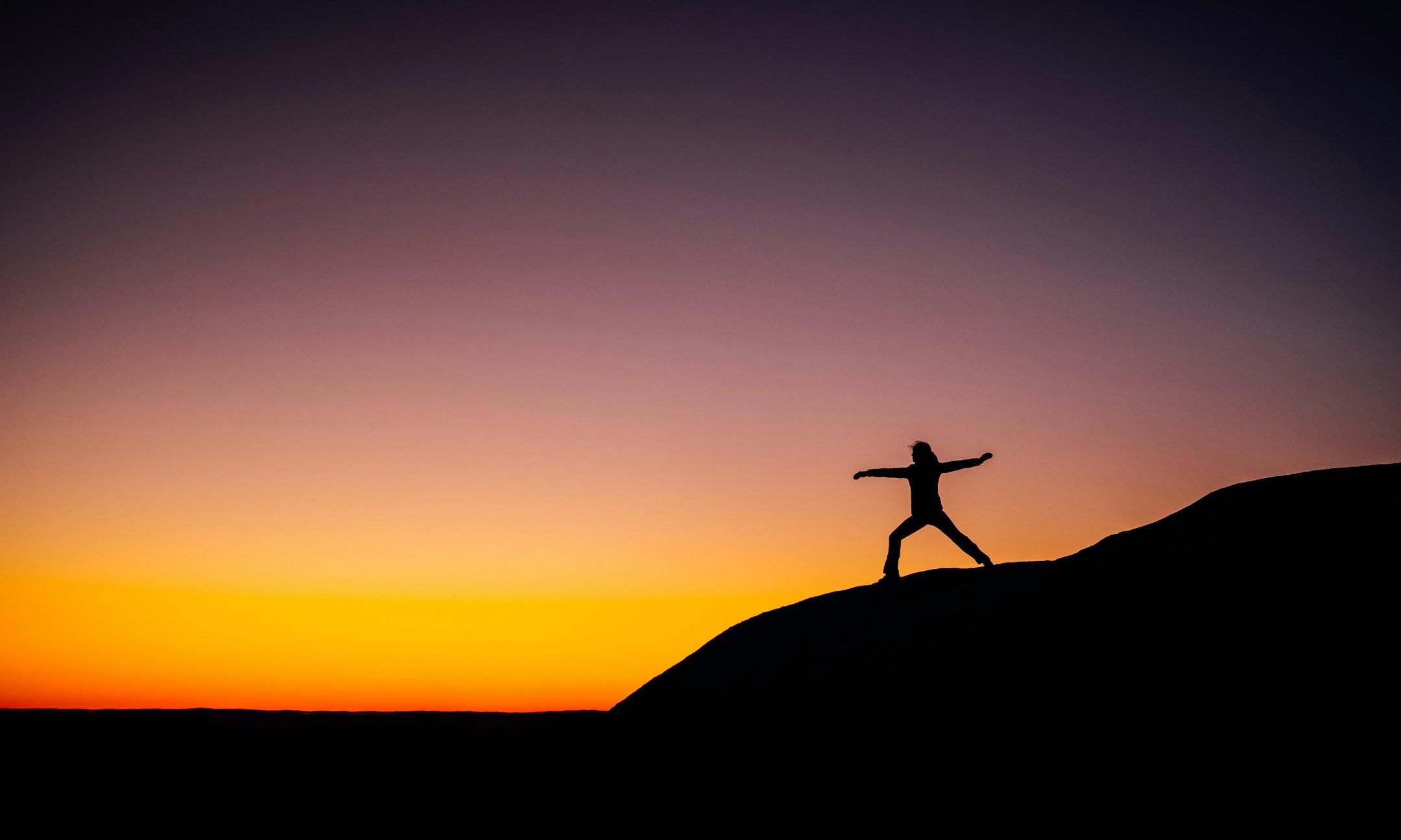 Yoga at sunset on the coast