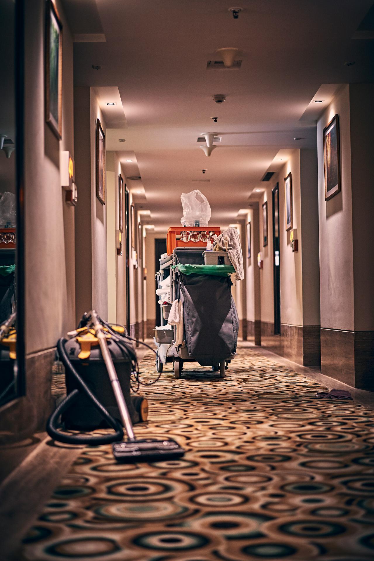 Room cleaning items in hallway