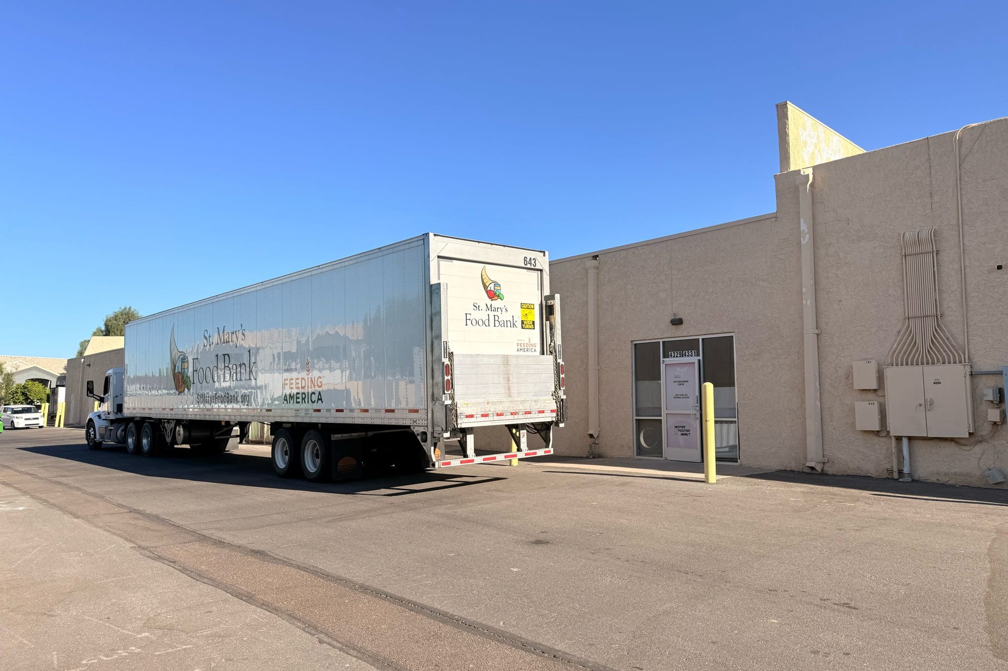A St. Mary's Food Bank trailer delivering to the Brighter View building.
