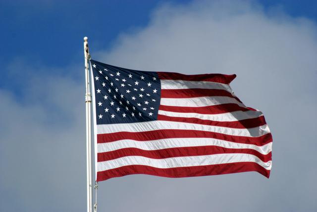 The flag of The United States of America waves in the breeze.