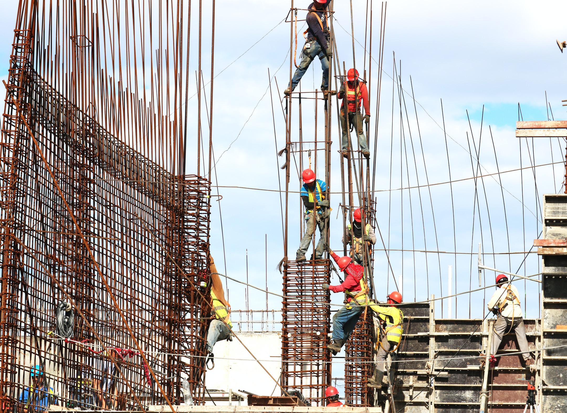 group of construction workers building