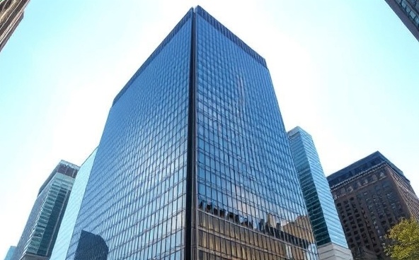 Luxury modern glass high-rise building with premium real estate capital markets aesthetic