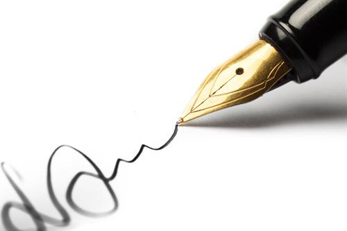 signing contract.jpg