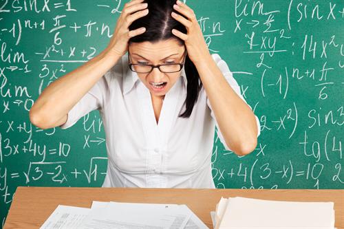 frustrated woman at desk.png