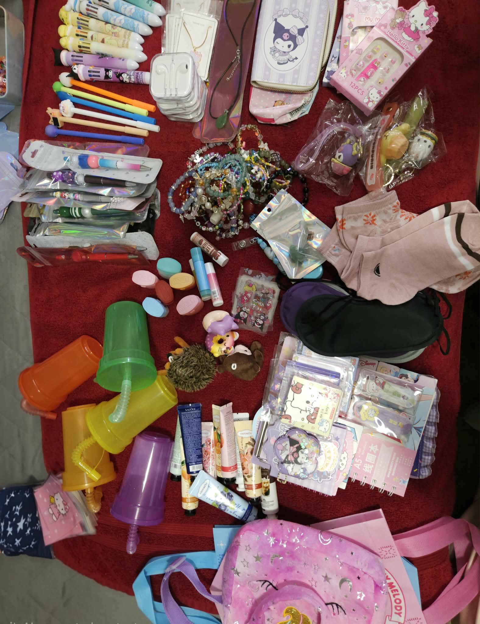 Example prizes and charms included in mystery bracelets