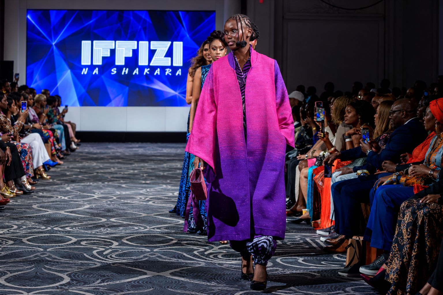 fuchsia coat on the iffizi runway.png