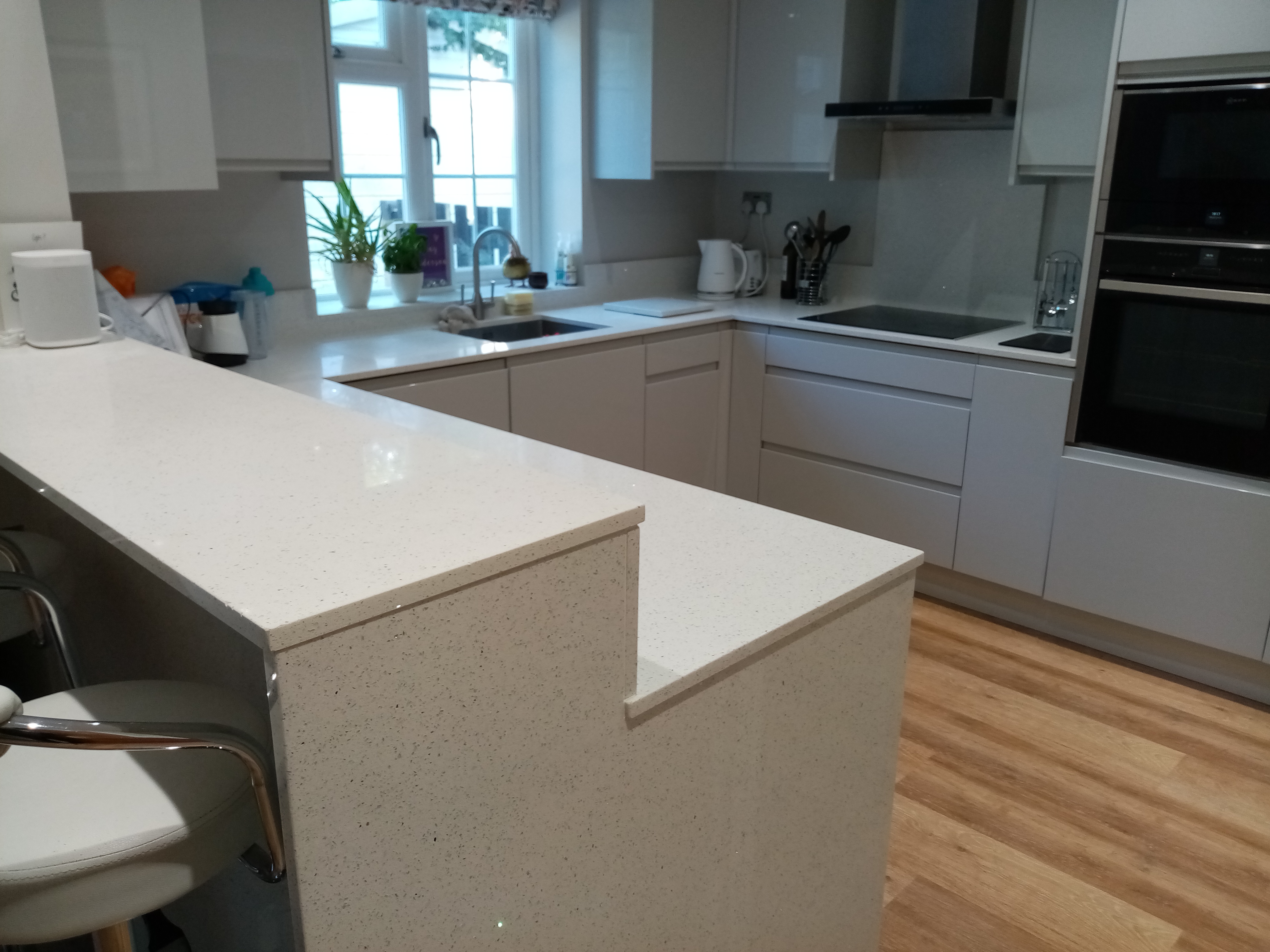 Kitchen renovation with modern cabinetry and finishes