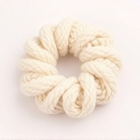 Handmade yarn scrunchies in soft pastel colors