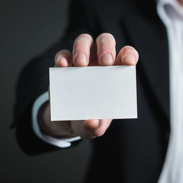 holding blank business card identity_1.png