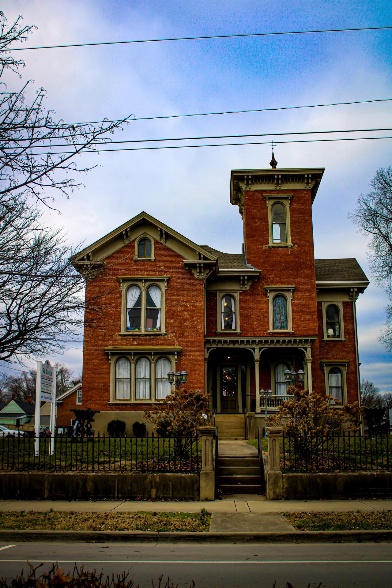 Charming historic brick mansion showcasing classic architecture in New Albany.