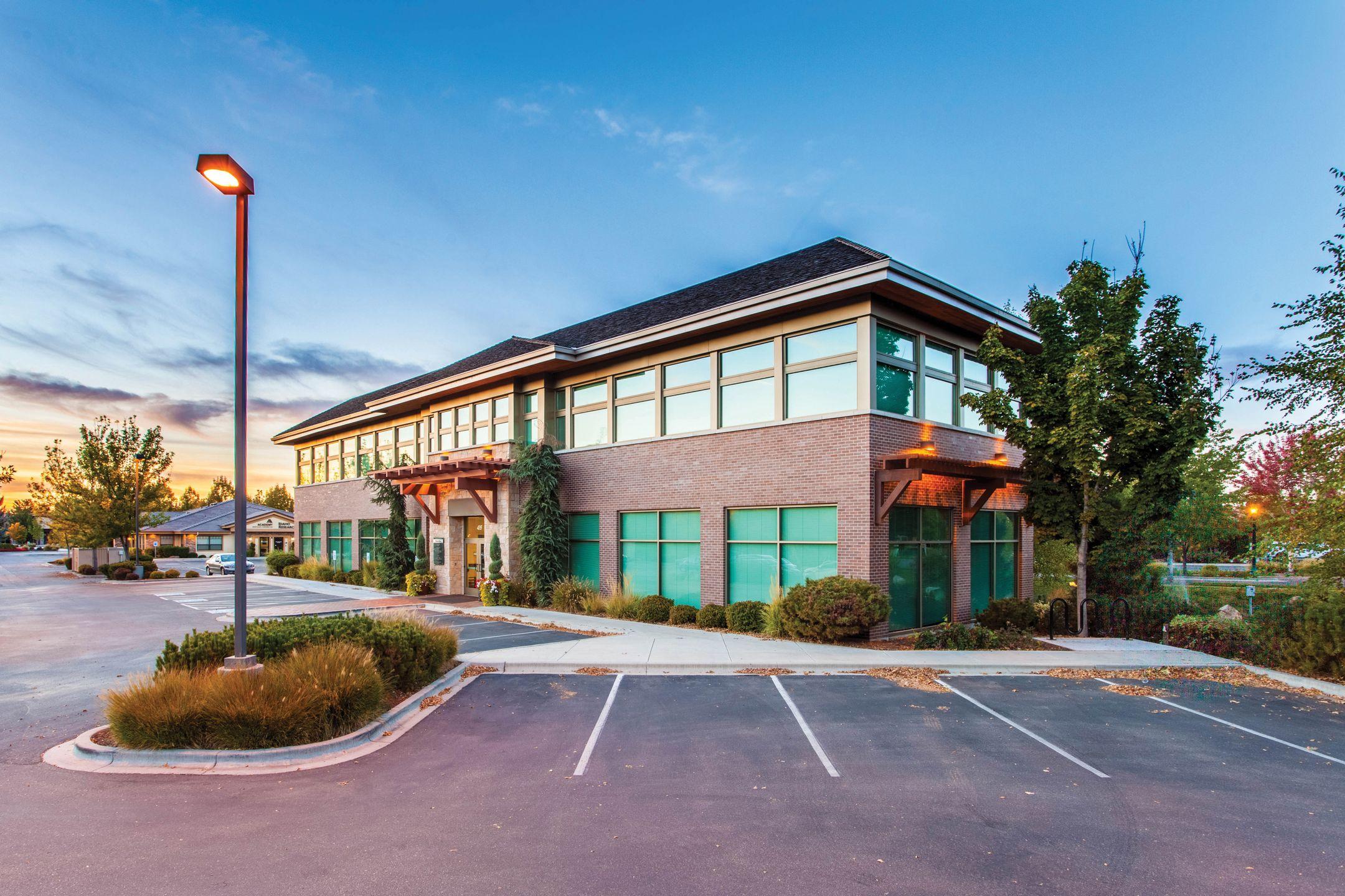 Two-story commercial office building with parking