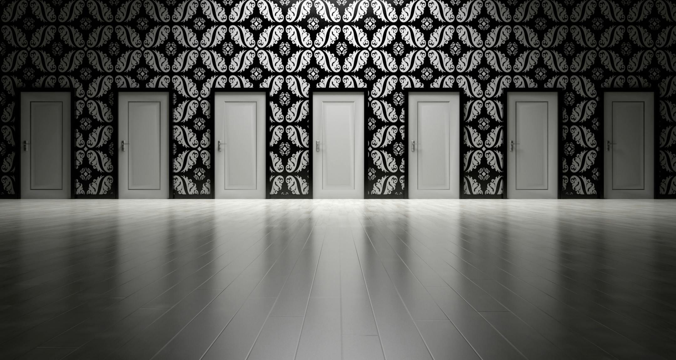 Five closed doors in a black and white ornate hallway symbolizing opportunities and decisions.