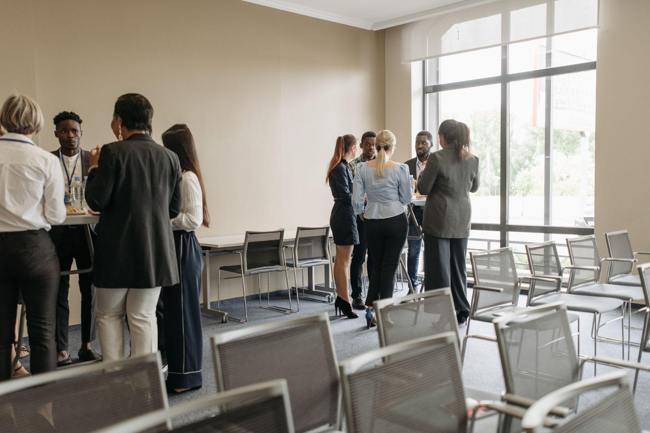 Professionals networking at a business event