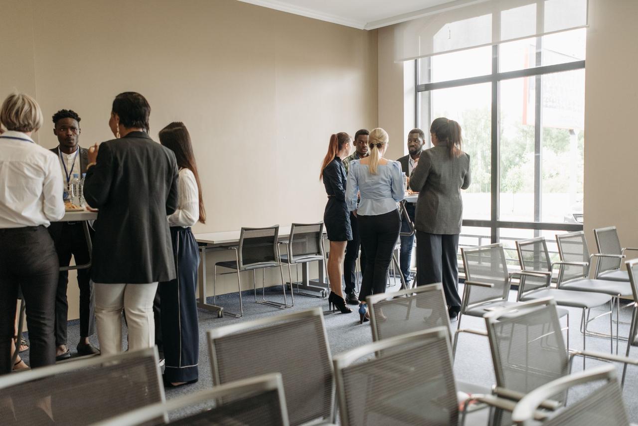Professionals networking at a business event