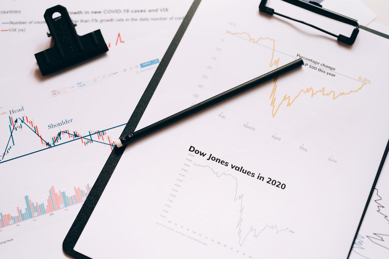Market data charts on paper