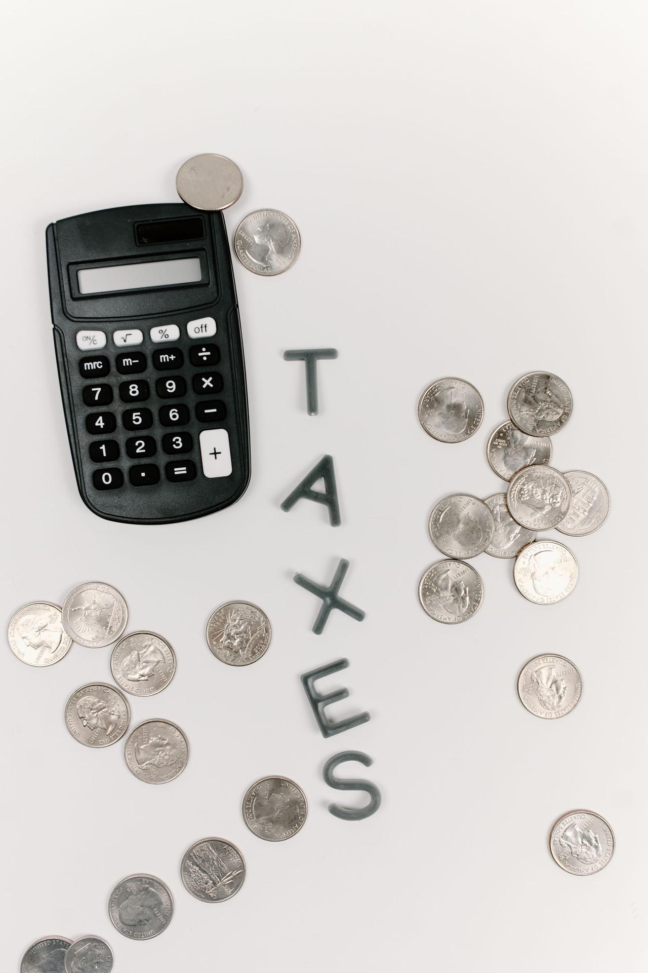 Calculator and coins for figuring taxes