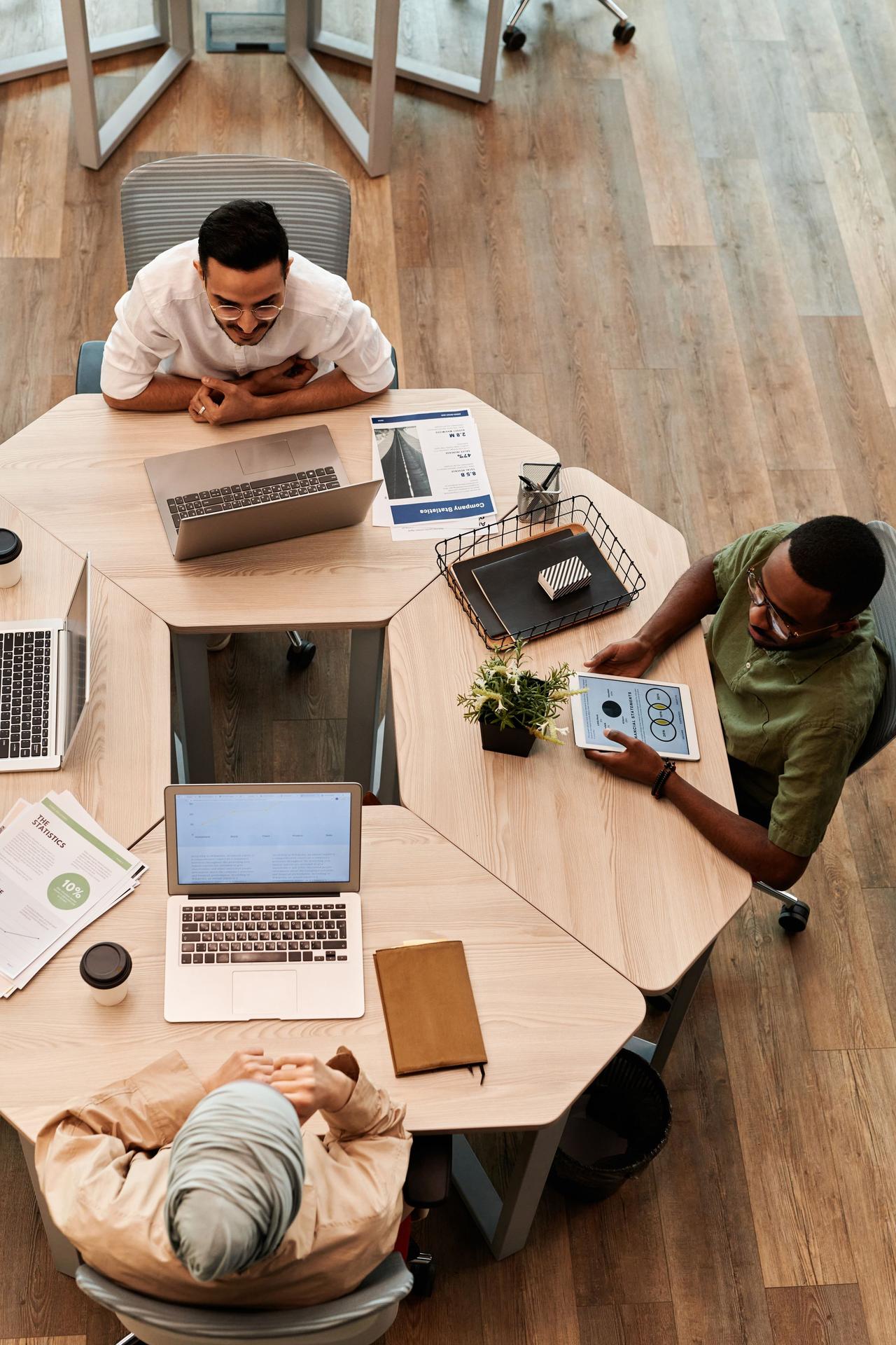 Investor team working at a shared table