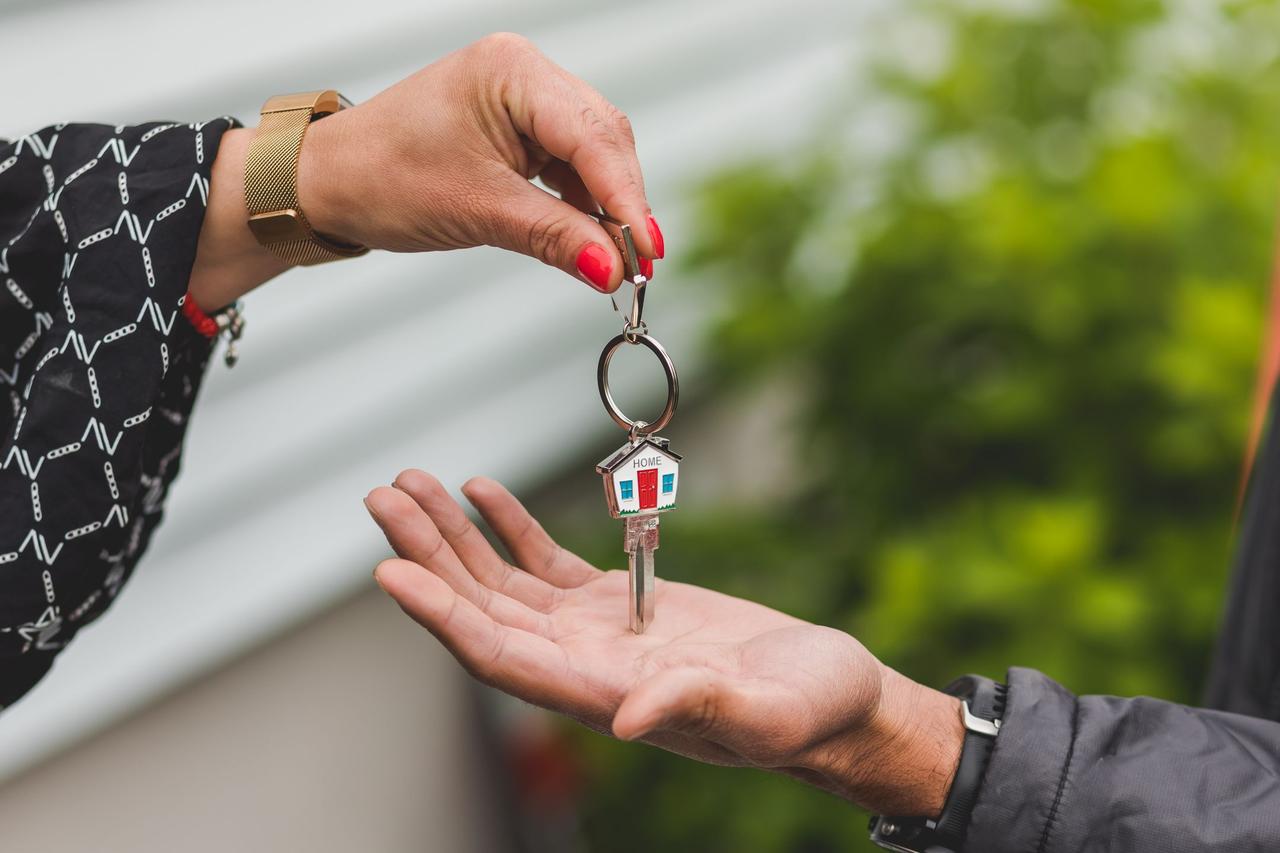 House keys handed over in a real estate deal