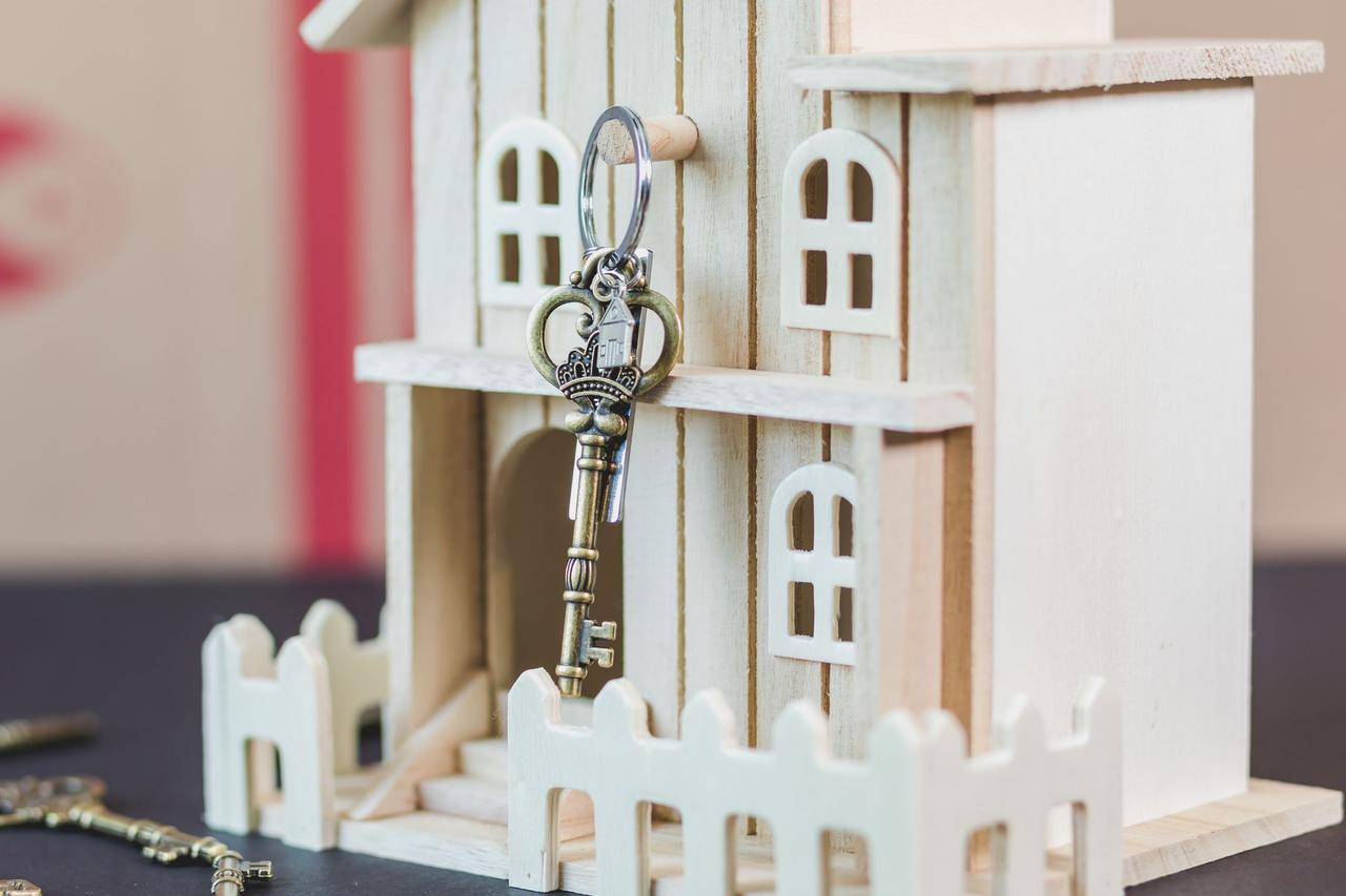 Model house with a set of house keys