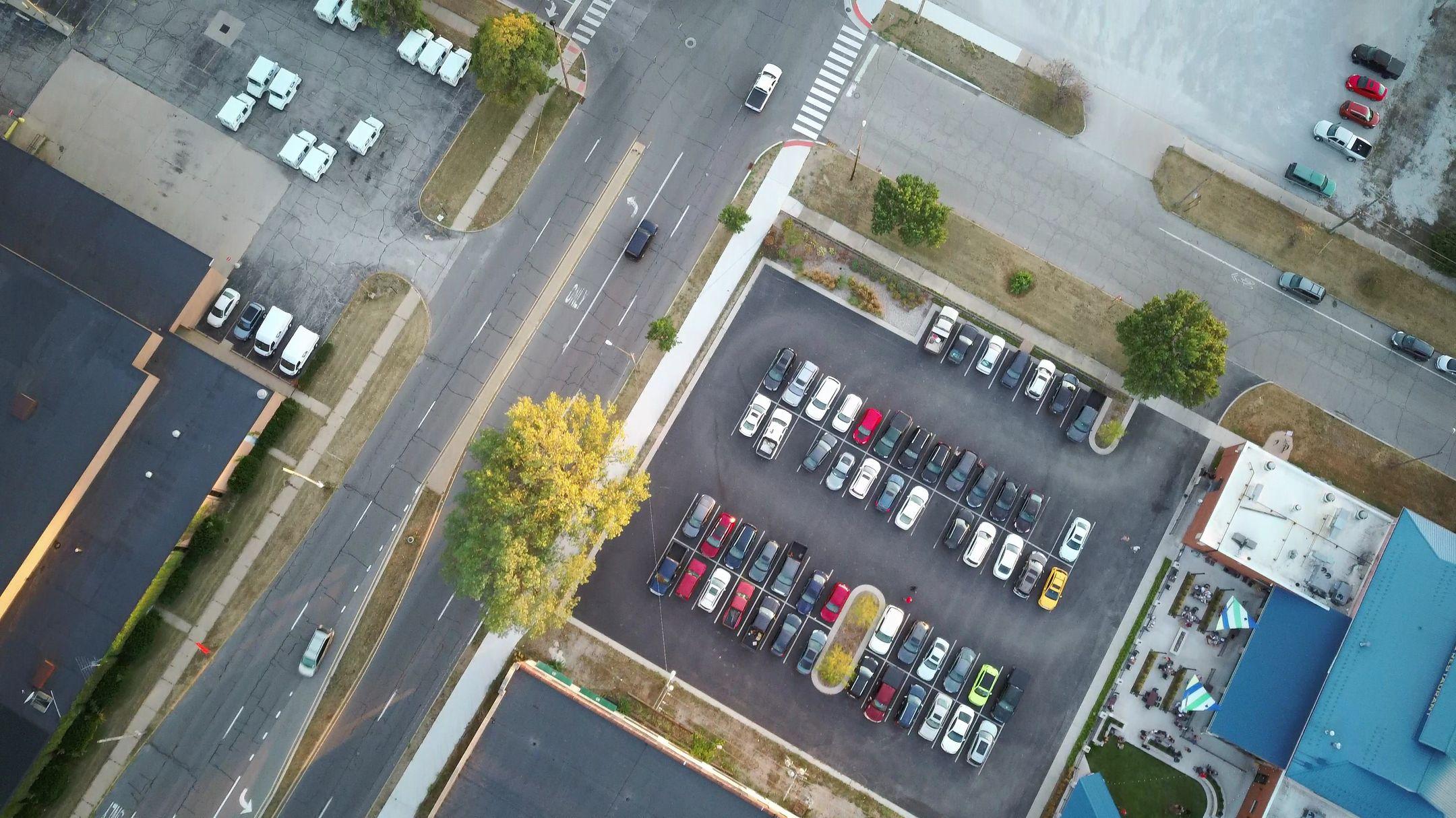 Aerial view of a retail strip center parking lot