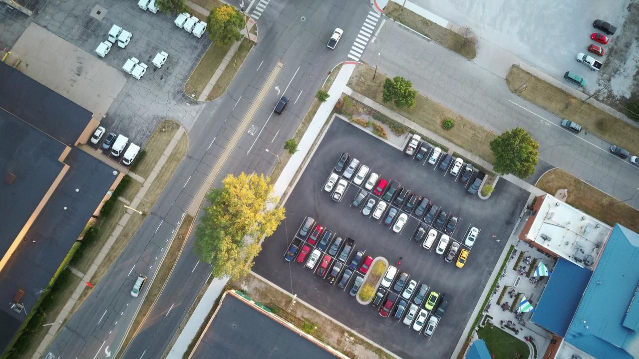 Aerial view of a retail strip center parking lot