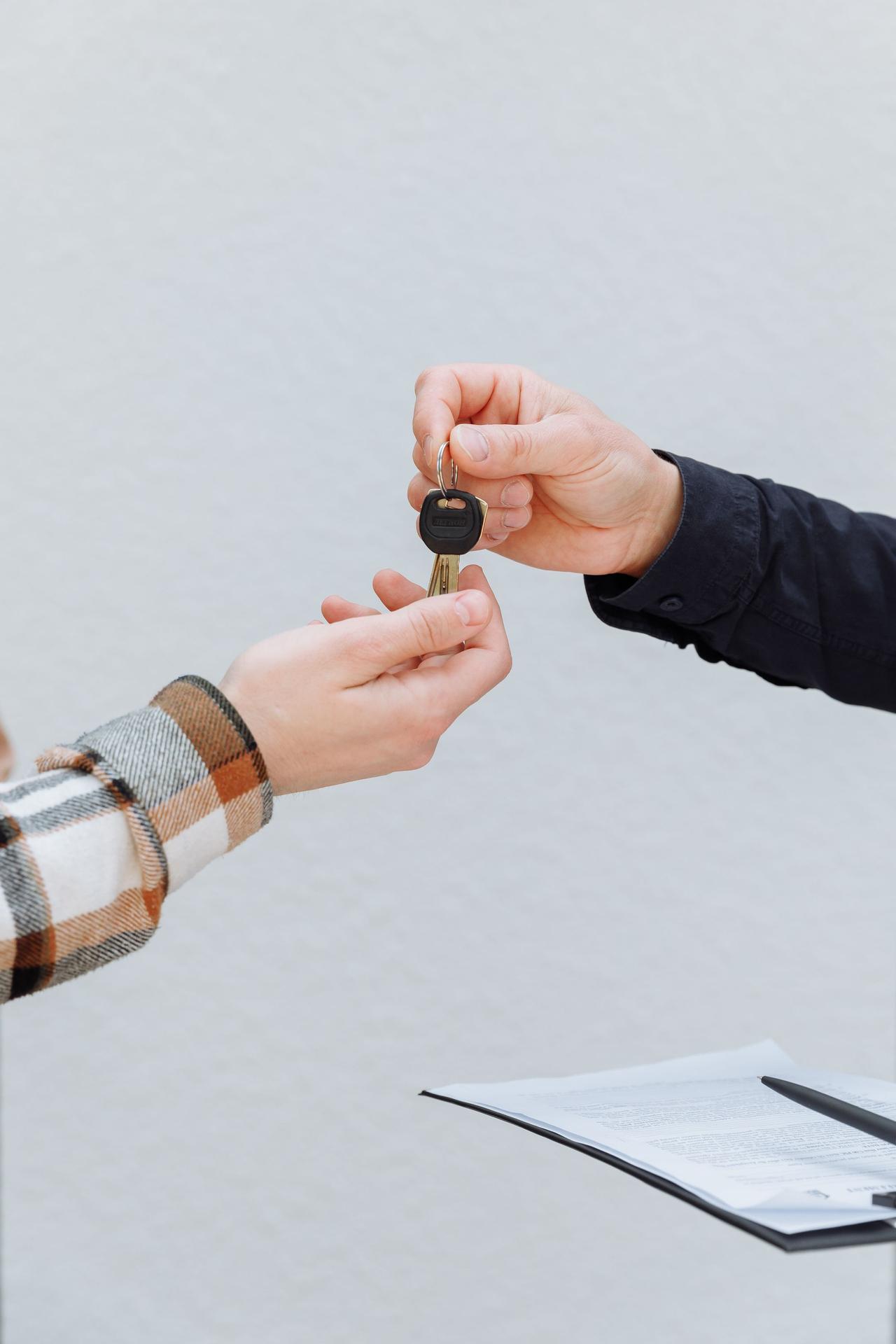 House keys being handed over at closing