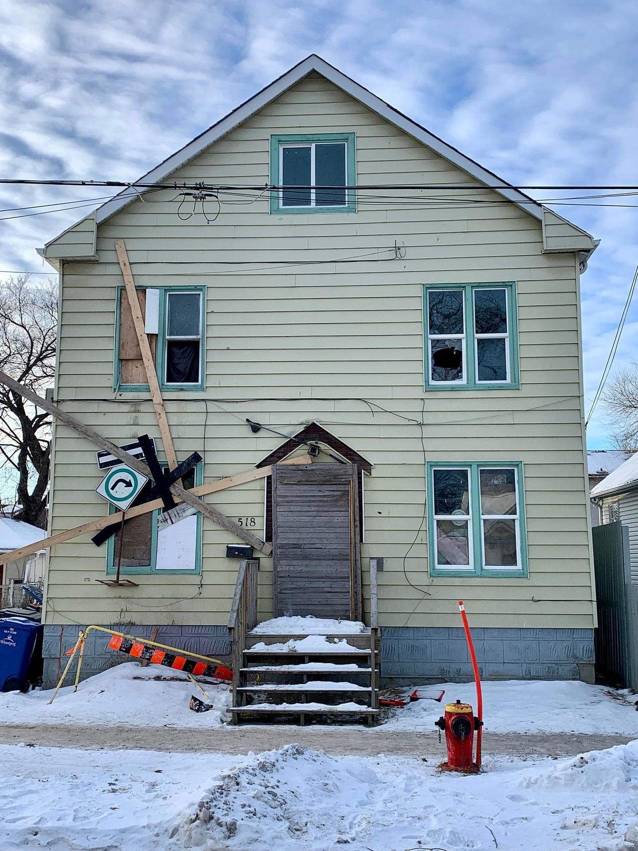 Worn older house facing foreclosure