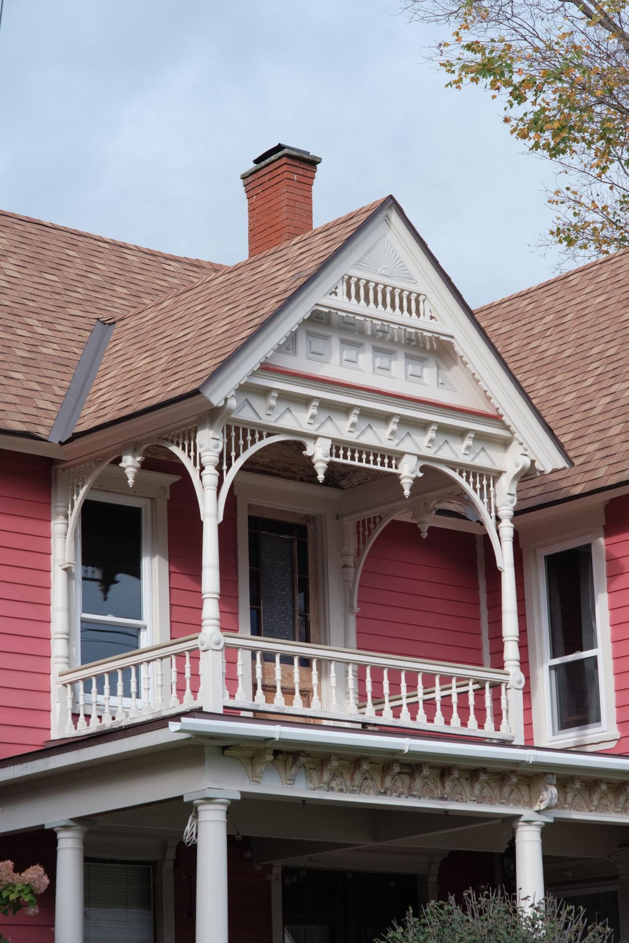 Victorian house porch with decorative trim