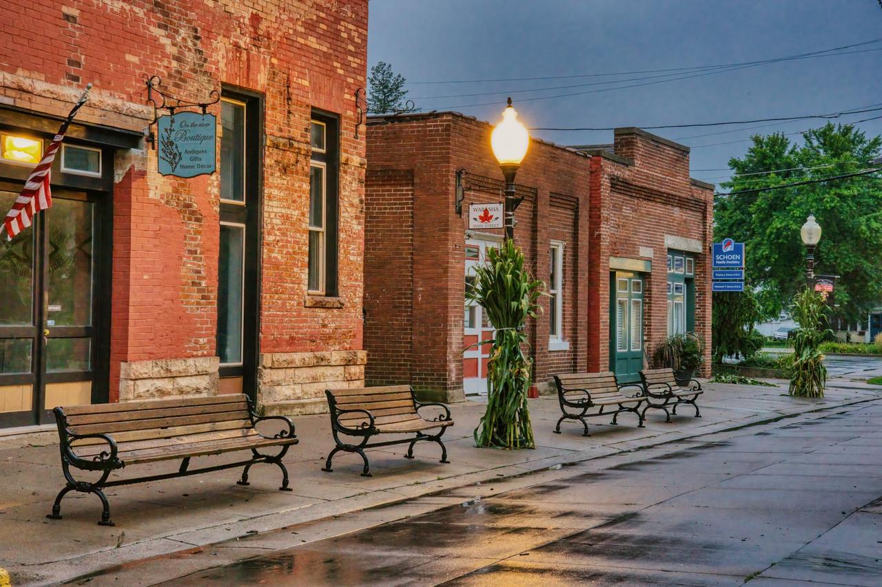 Brick storefronts along a neighborhood commercial street