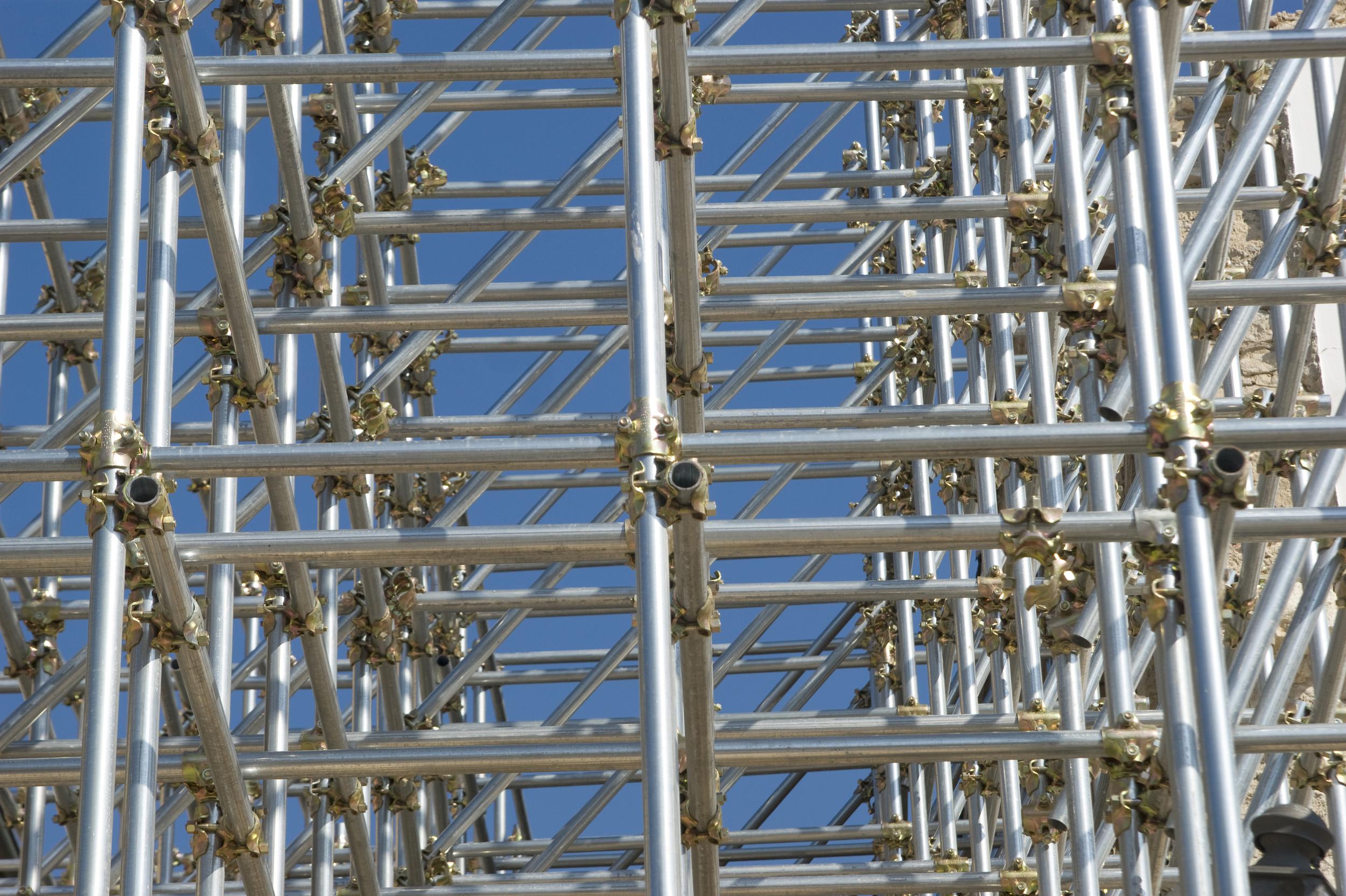 vecteezy_scaffolding-in-construction-site_30720289.jpg