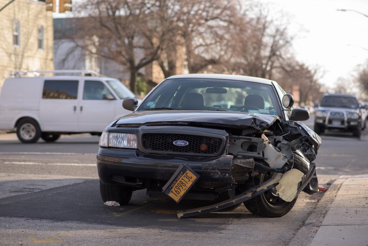 Taxi car damaged in a crash.