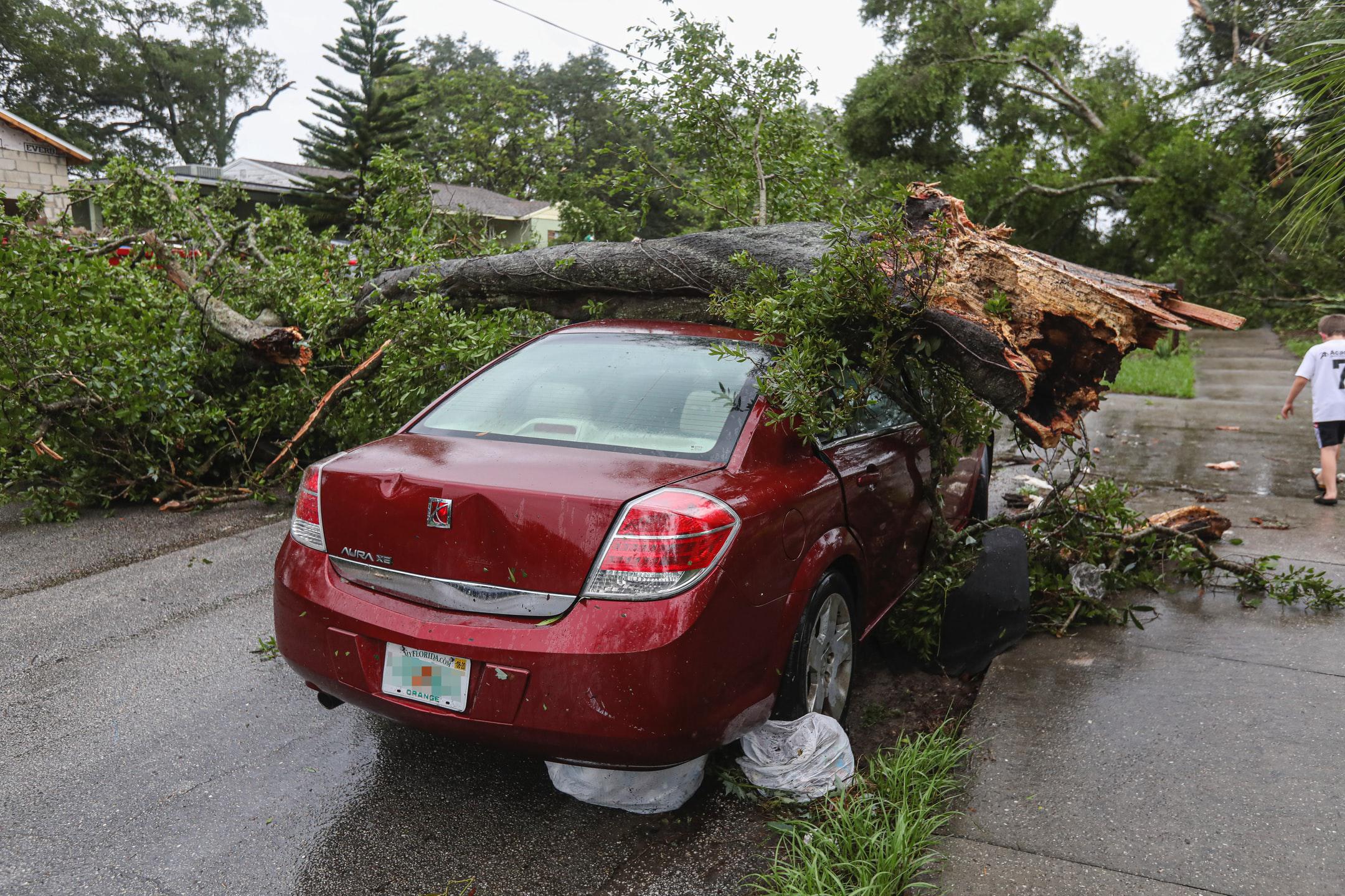 Image of the damage after a tornado, and an accident where someone will need help from a personal injury attorney in Rockville, MD.