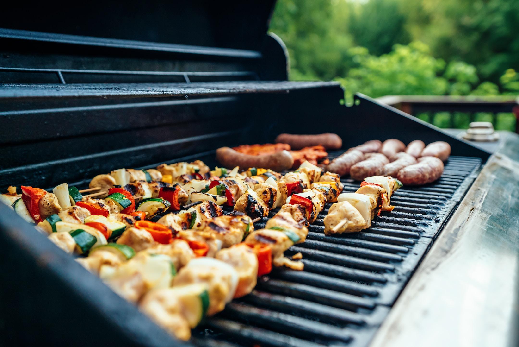 We joined a few friends for a Sunday afternoon cookout, and I found myself manning the grill. The colors caught my eye first, as I loved the contrast of the colorful kebabs with the blue of the grill and the green of the yard behind.