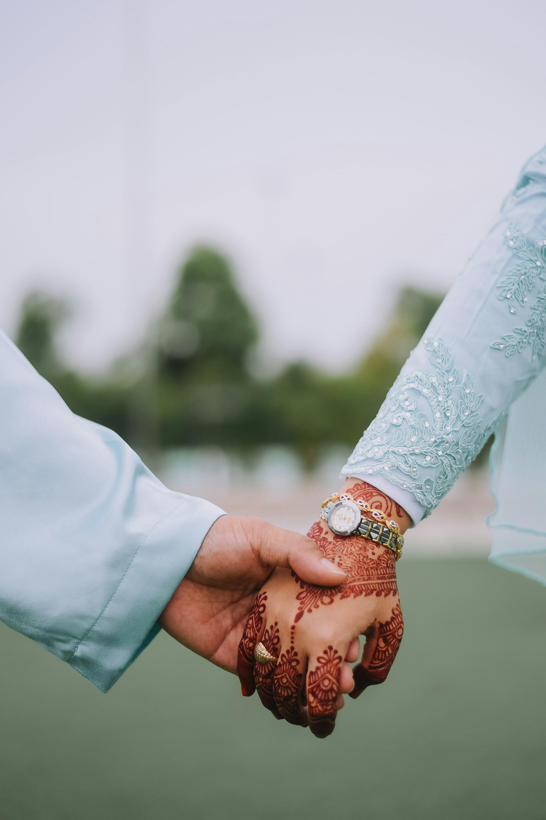 Couple holding hand