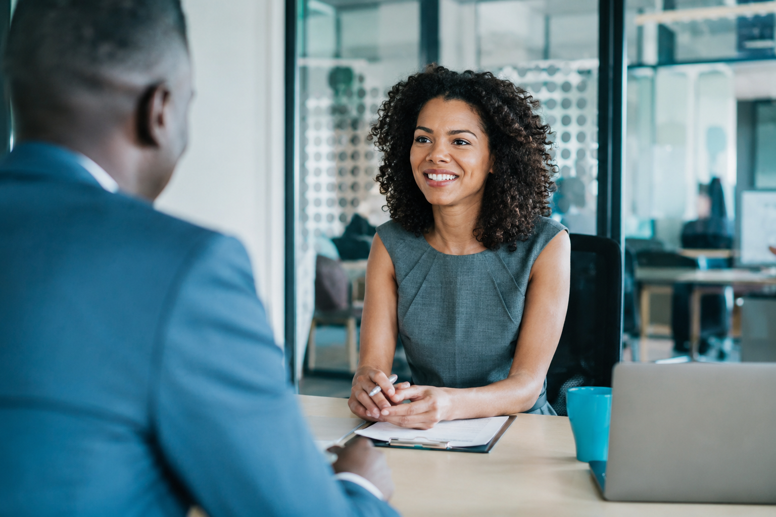 Professional diverse team of business professionals collaborating at a modern office table