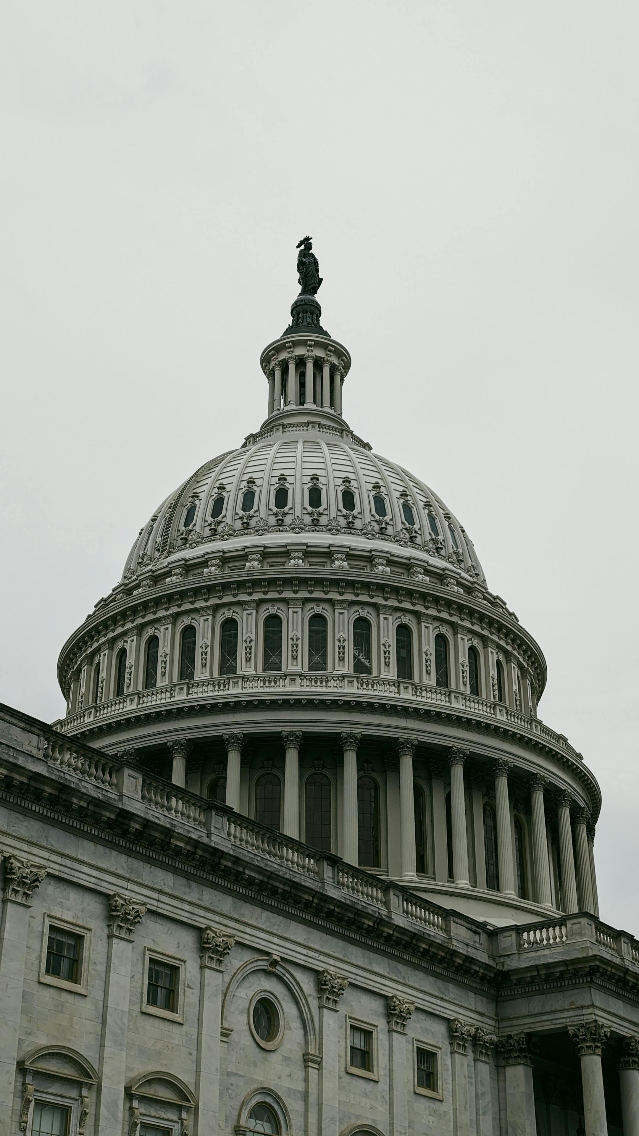 Close-up view of the iconic dome of the United States Capitol in Washington, D.C., a symbol of American democracy.