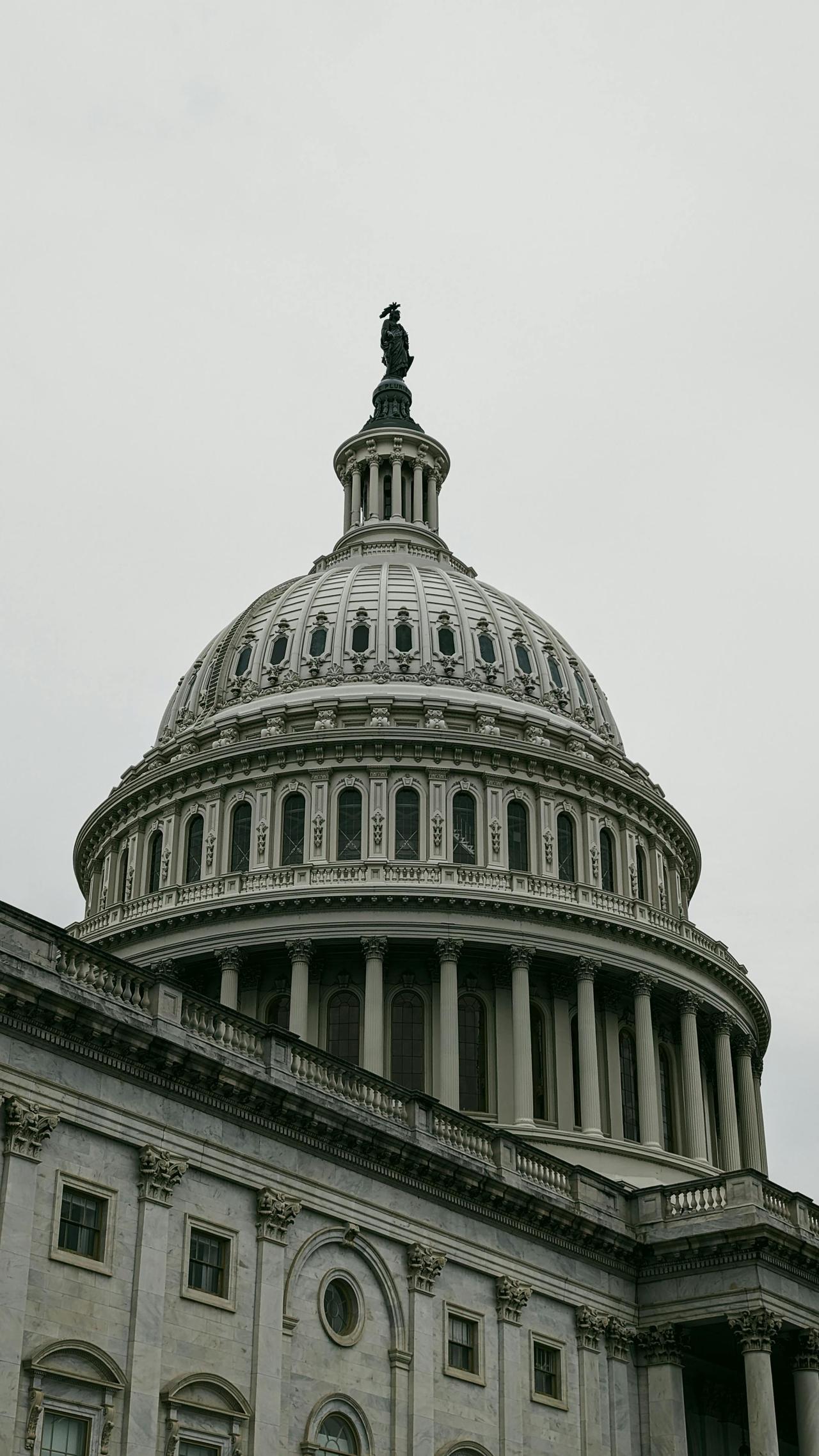 Close-up view of the iconic dome of the United States Capitol in Washington, D.C., a symbol of American democracy.