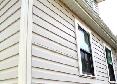 Professional siding installation completed