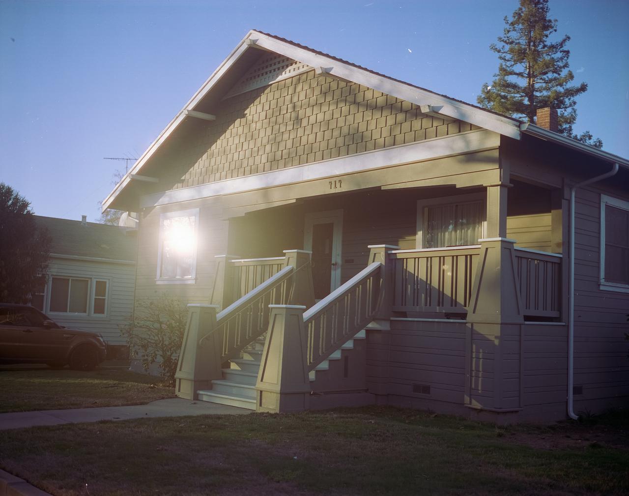 Image of a house with a clean exterior after working with a professional power washing company.