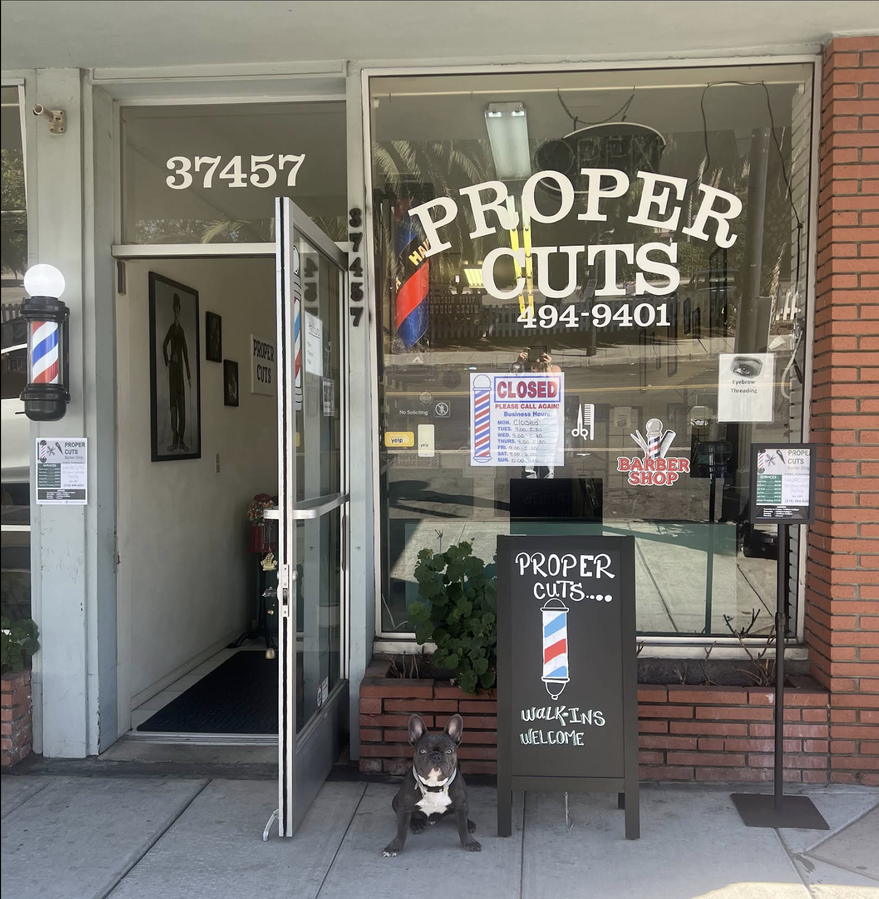 Niles Proper Cuts barbershop storefront