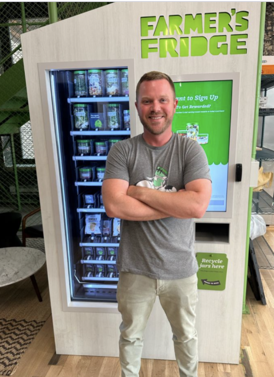 Culinary consultant working with food brand leaders in professional kitchen