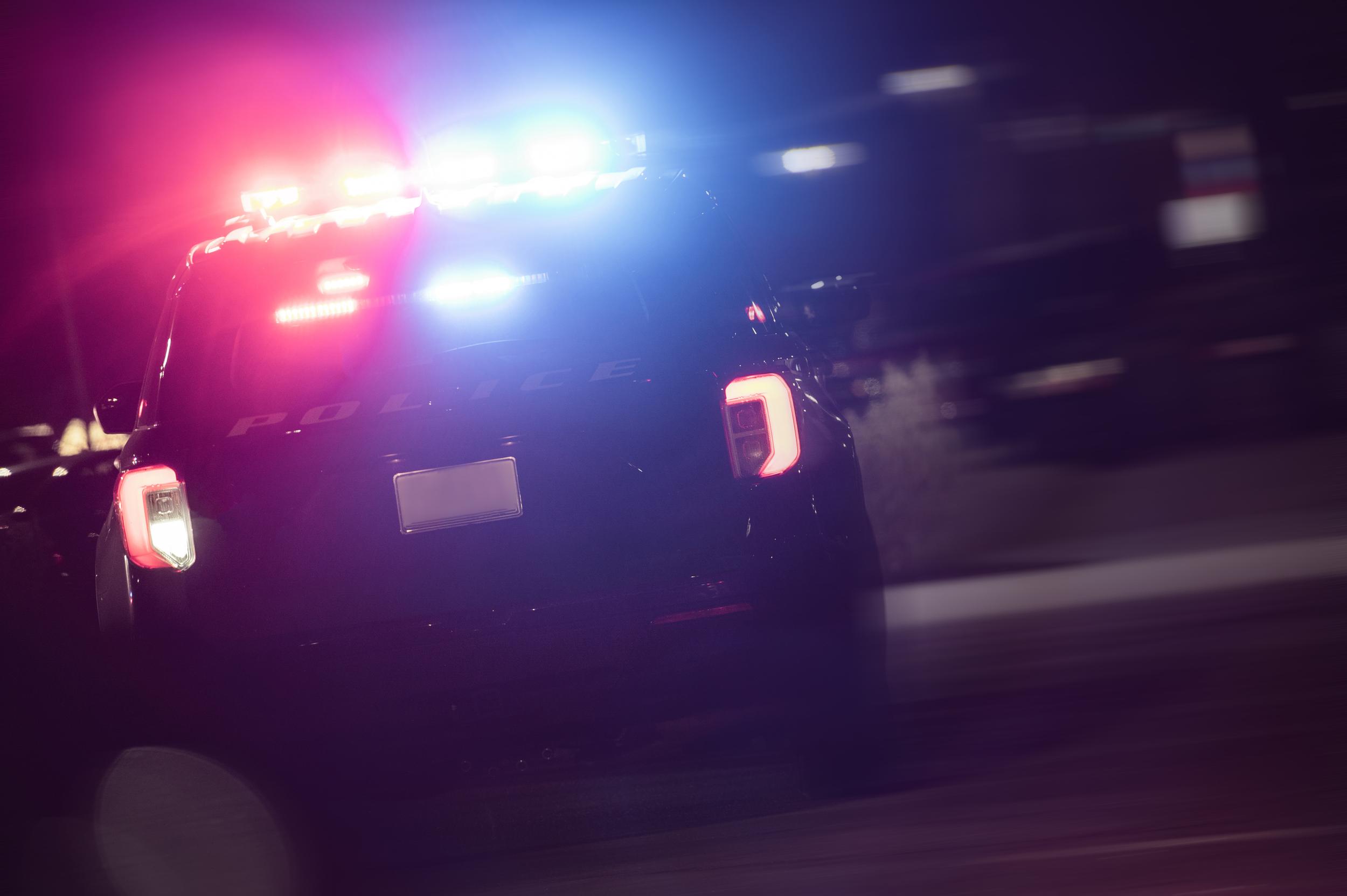 police-car-at-night-with-flashing-lights-2026-09-24-08-09-12-utc.jpeg