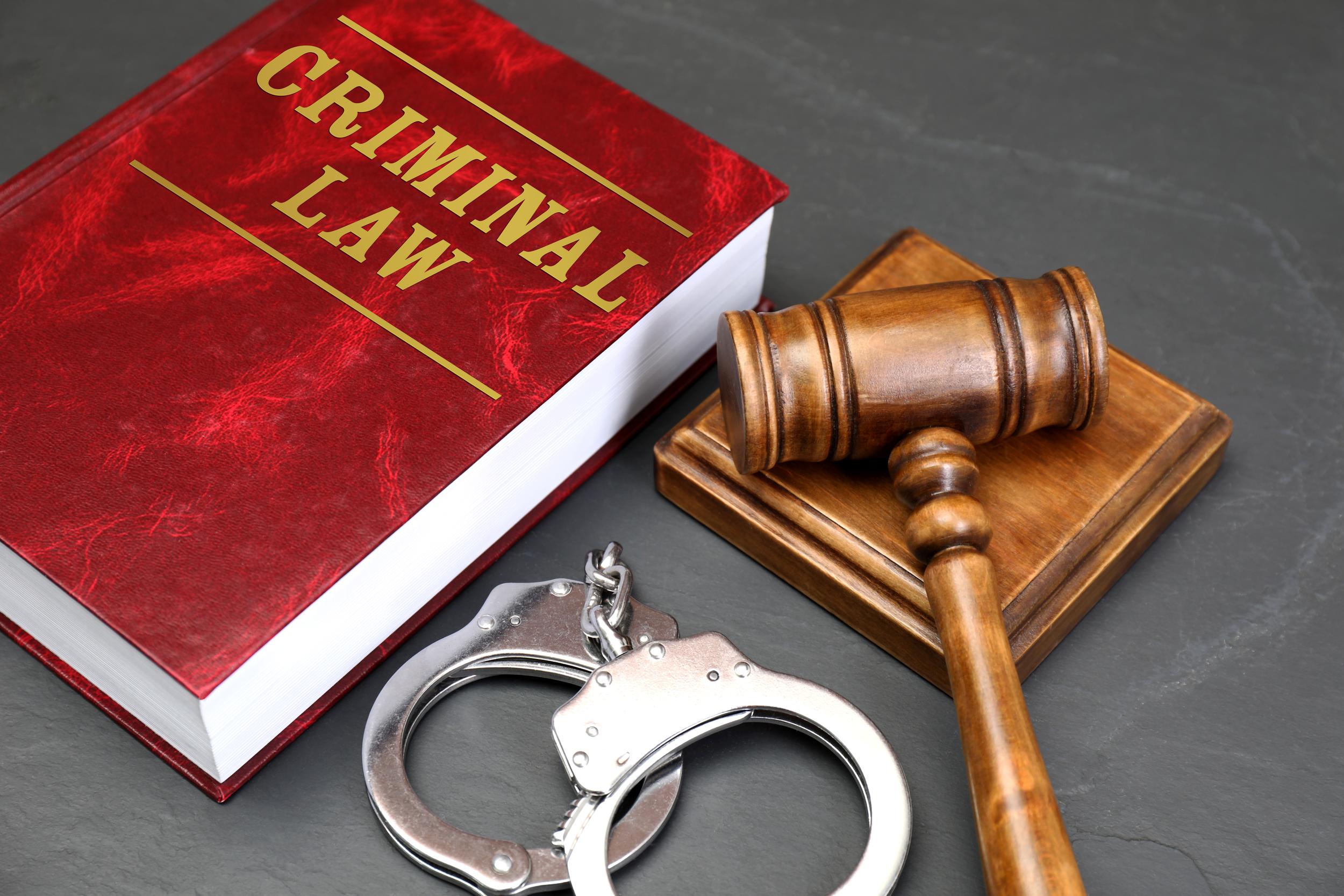 criminal-law-book-with-gavel-and-handcuffs-2026-09-25-01-04-51-utc.jpg